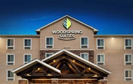 خرید WoodSpring Suites  توسط Choice